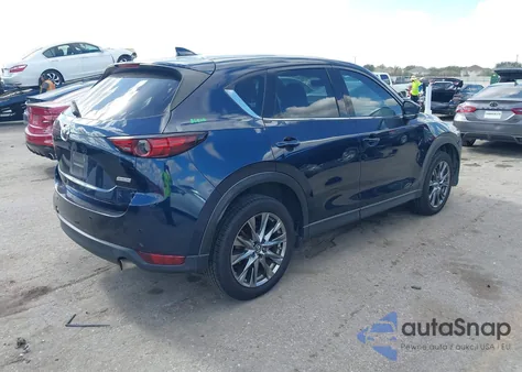 2019 Mazda Cx-5 Signature z USA, uszkodzony, nr VIN JM3KFBEY6K0649569
